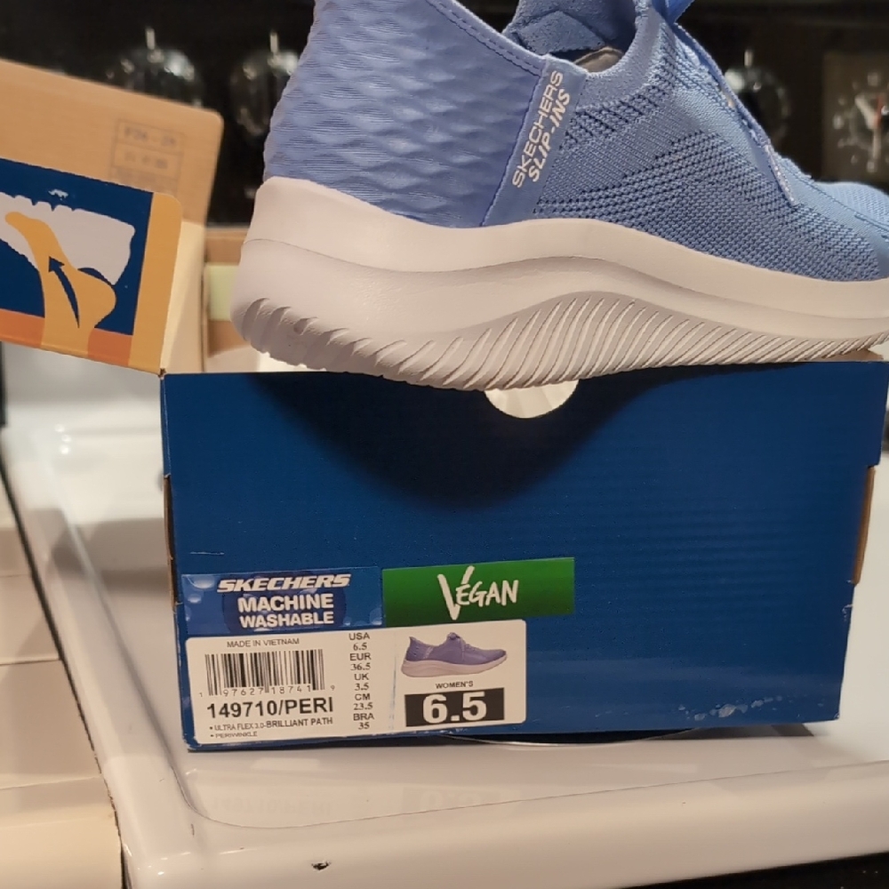 Skechers Women's Light Blue Knit Slip-On Athletic Sneakers